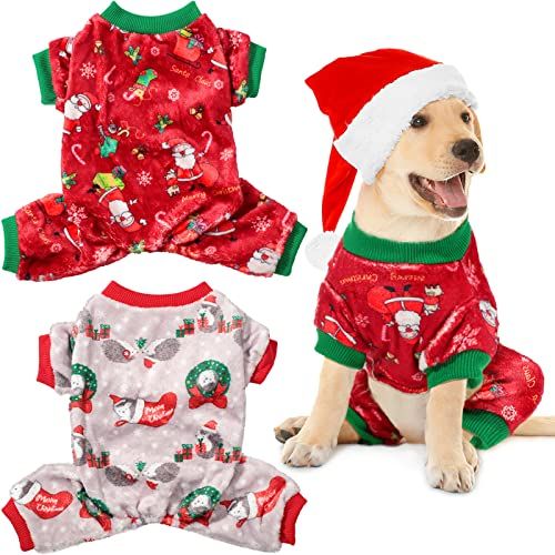 Dog wearing a red Christmas outfit with green trim, sitting next to two other outfits on a white background. "Haven Crystals Pet Store"